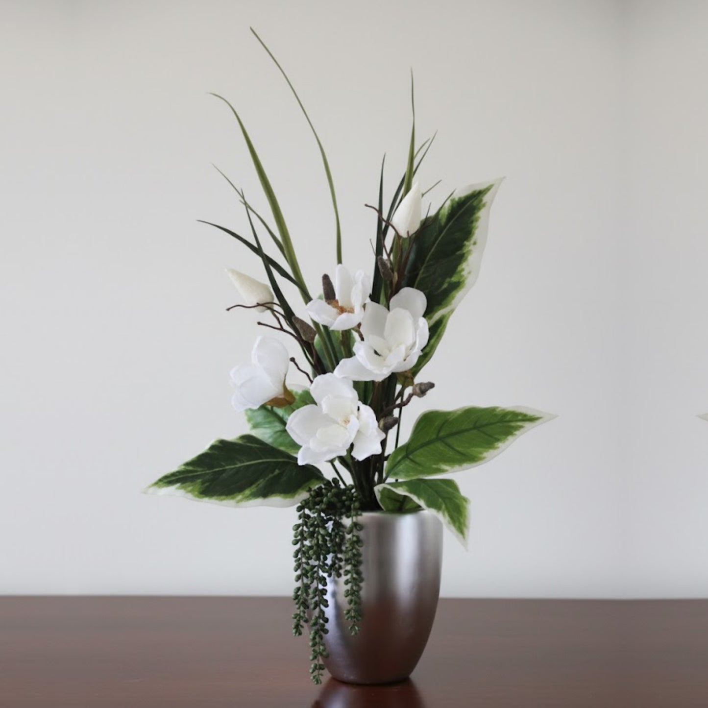 Silver Vase With Magnolia & Hosta